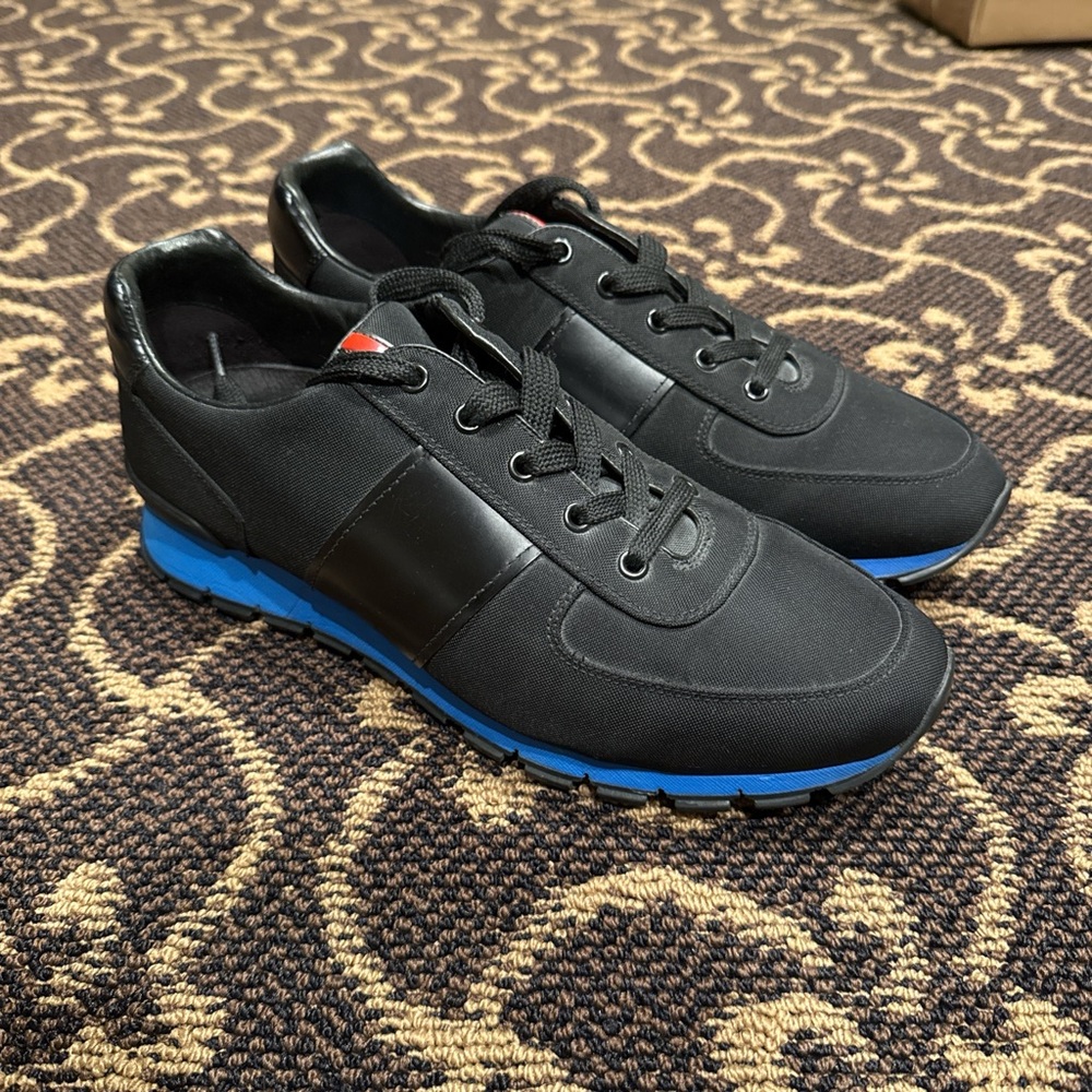 Prada Black Sneakers with Vibrant Blue Accents